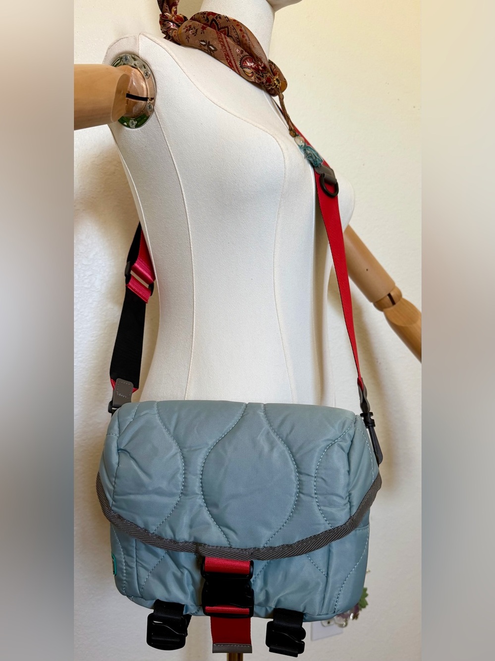 Bagsmart- Light Blue Quilted Crossbody Camera Bag with Red Accent Strap